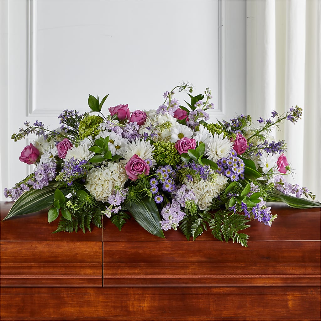 Meadows of Serenity Casket Spray – White Lilies N Paradise, Kokomo IN